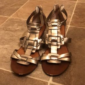Gently worn silver strapped sandals